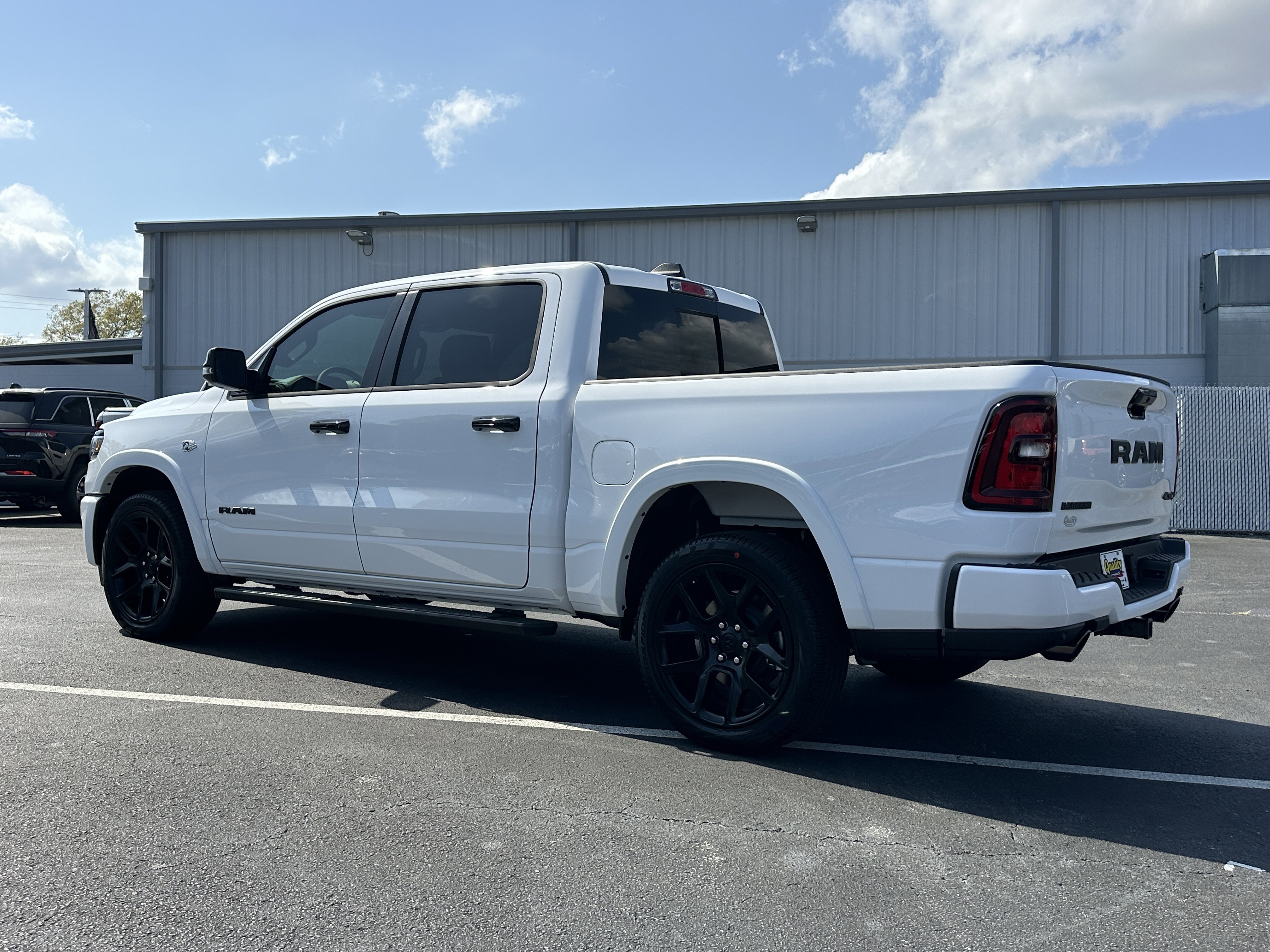 New 2026 Bright White Clear-Coat Exterior Paint RAM Laramie image 6