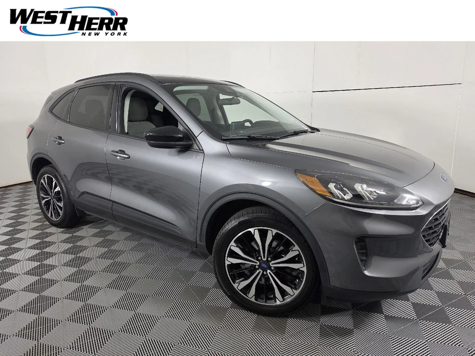 Used 2022 Carbonized Gray Ford SE image 1
