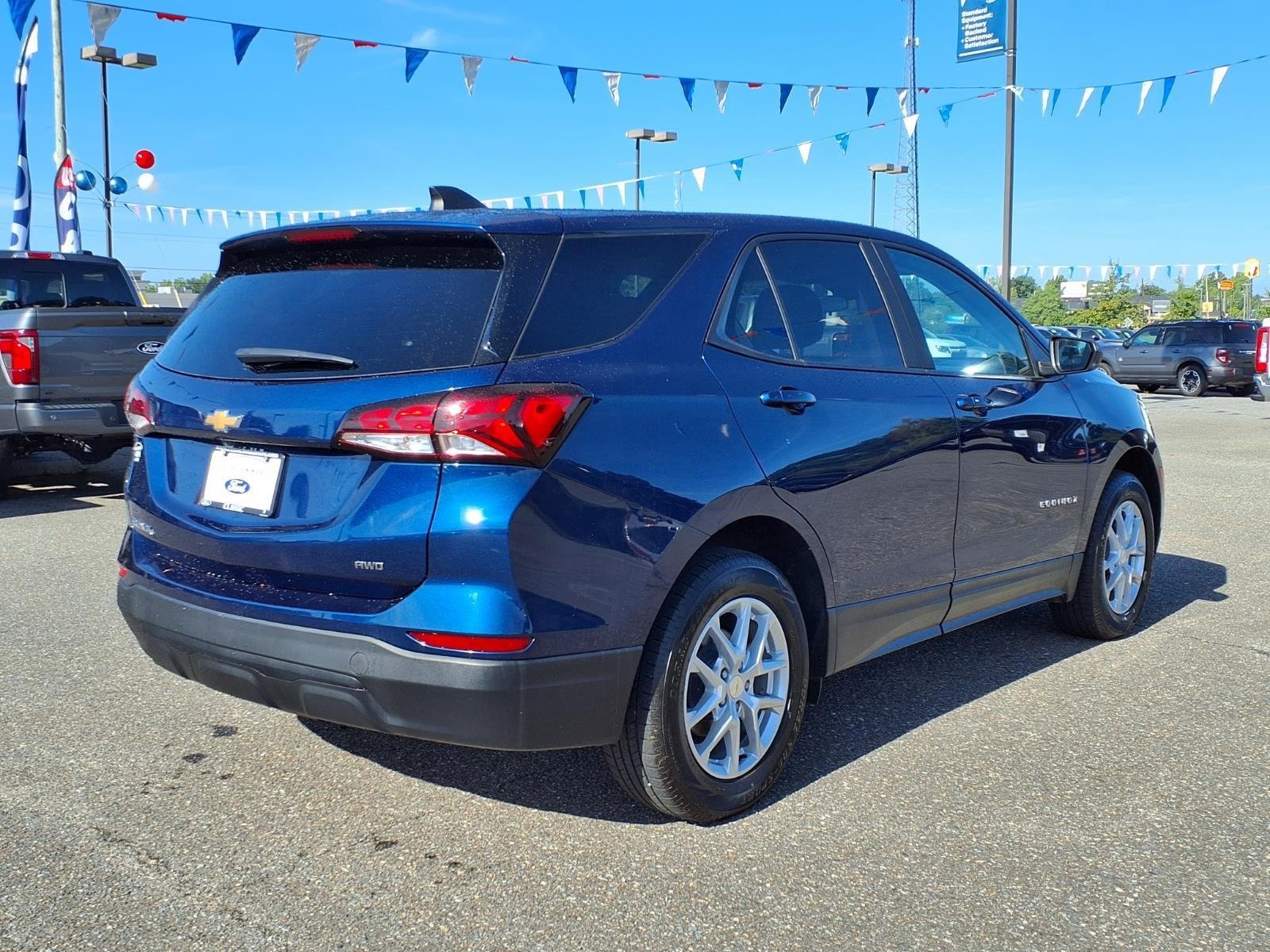 Used 2023 Blue Glow Metallic Chevrolet LS image 2