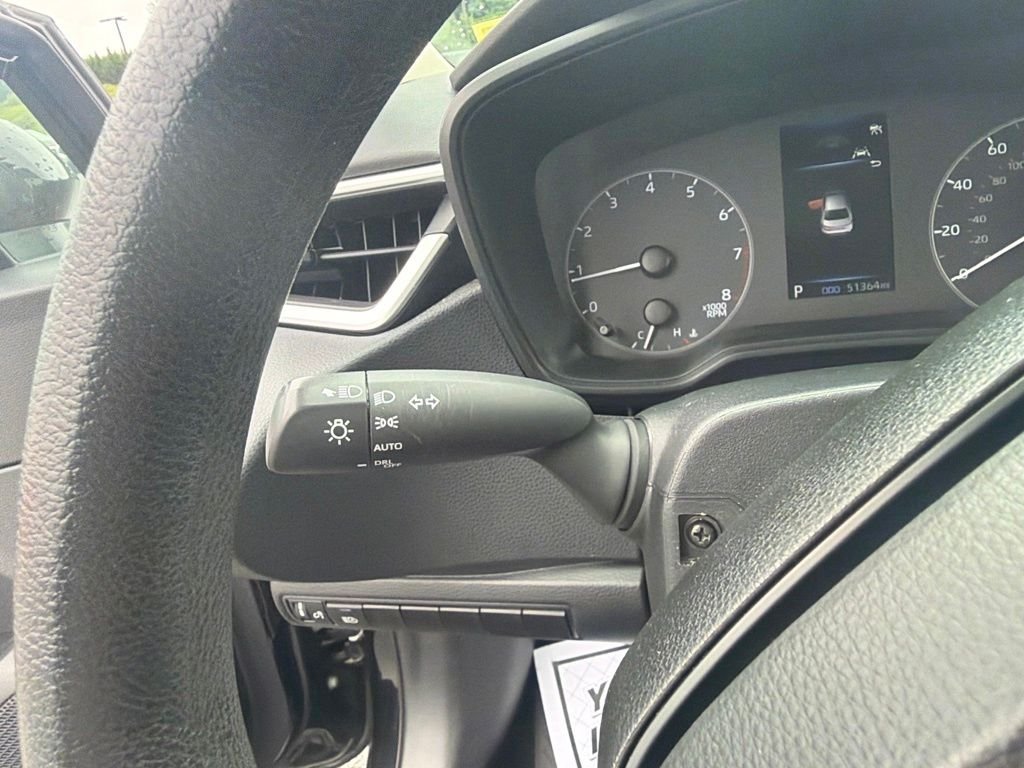 Used 2023 Midnight Black Metallic Toyota LE image 29