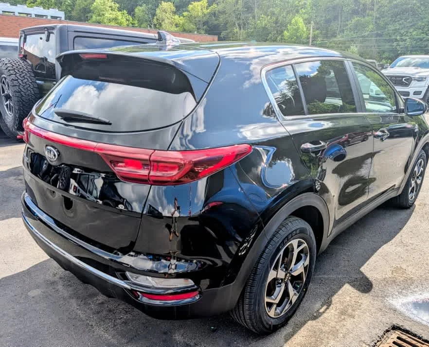 Used 2021 Black Cherry Kia LX image 6
