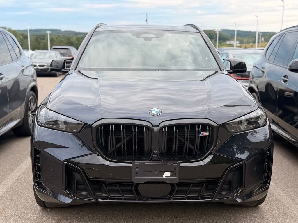 Used 2026 Carbon Black Metallic BMW M60i image 2
