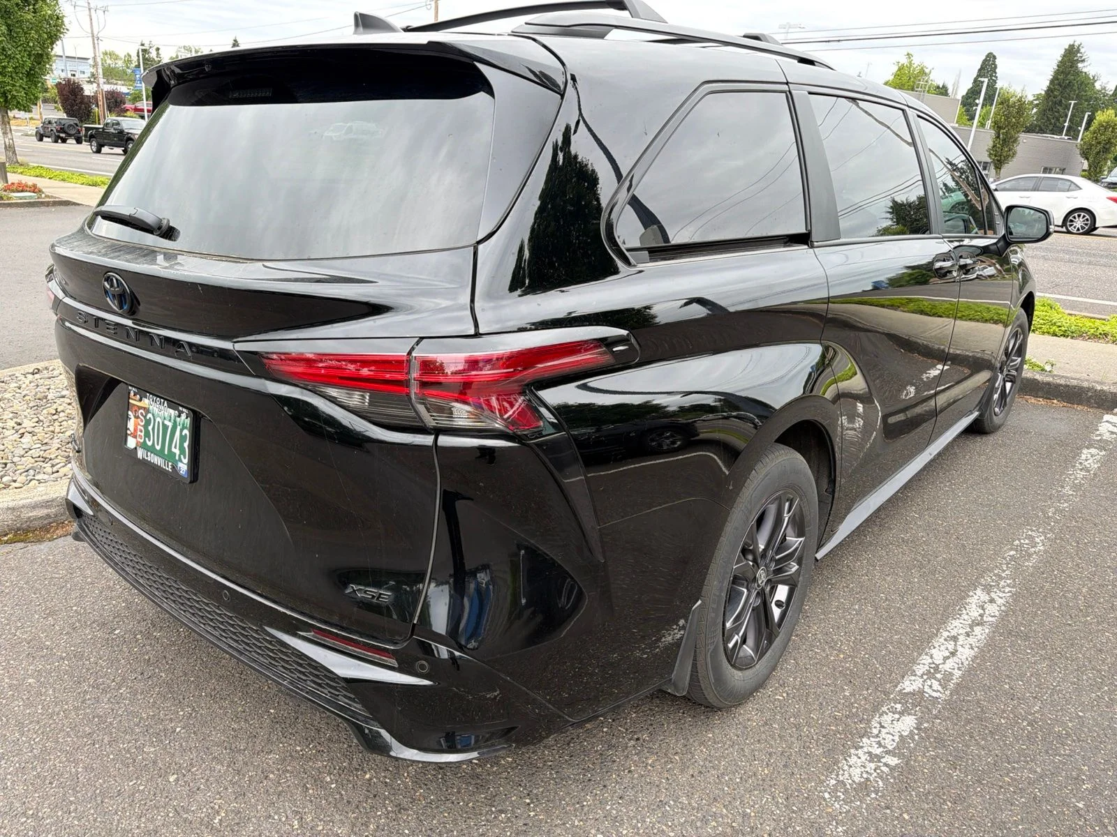 Used 2025 Midnight Black Metallic Toyota XSE 7 Passenger image 4