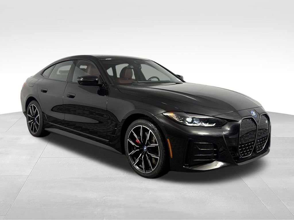 Used 2023 Black Sapphire Metallic BMW eDrive40 image 4