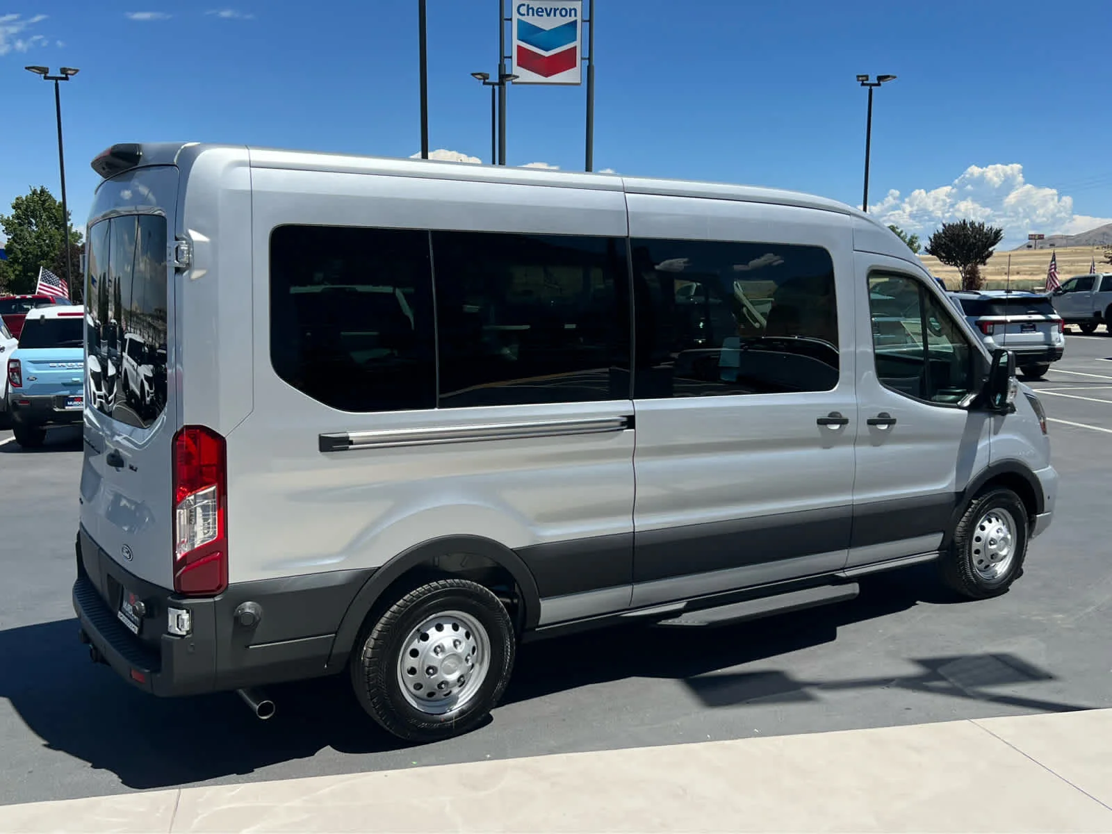 New 2026 Ingot Silver Metallic Ford Passenger Van XLT image 7