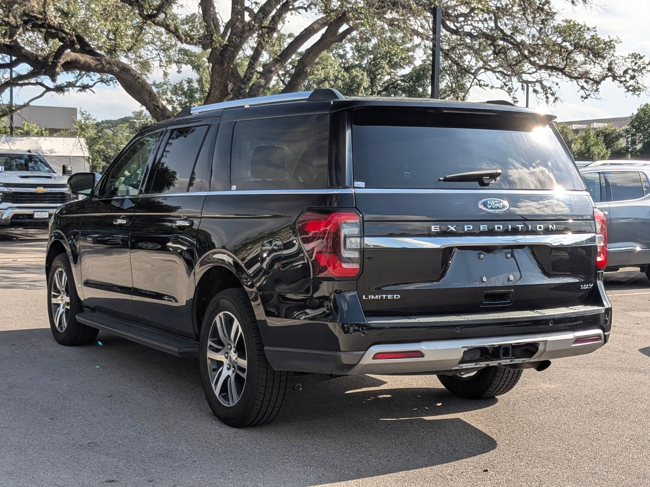 Used 2024 Black Metallic Ford Limited image 5