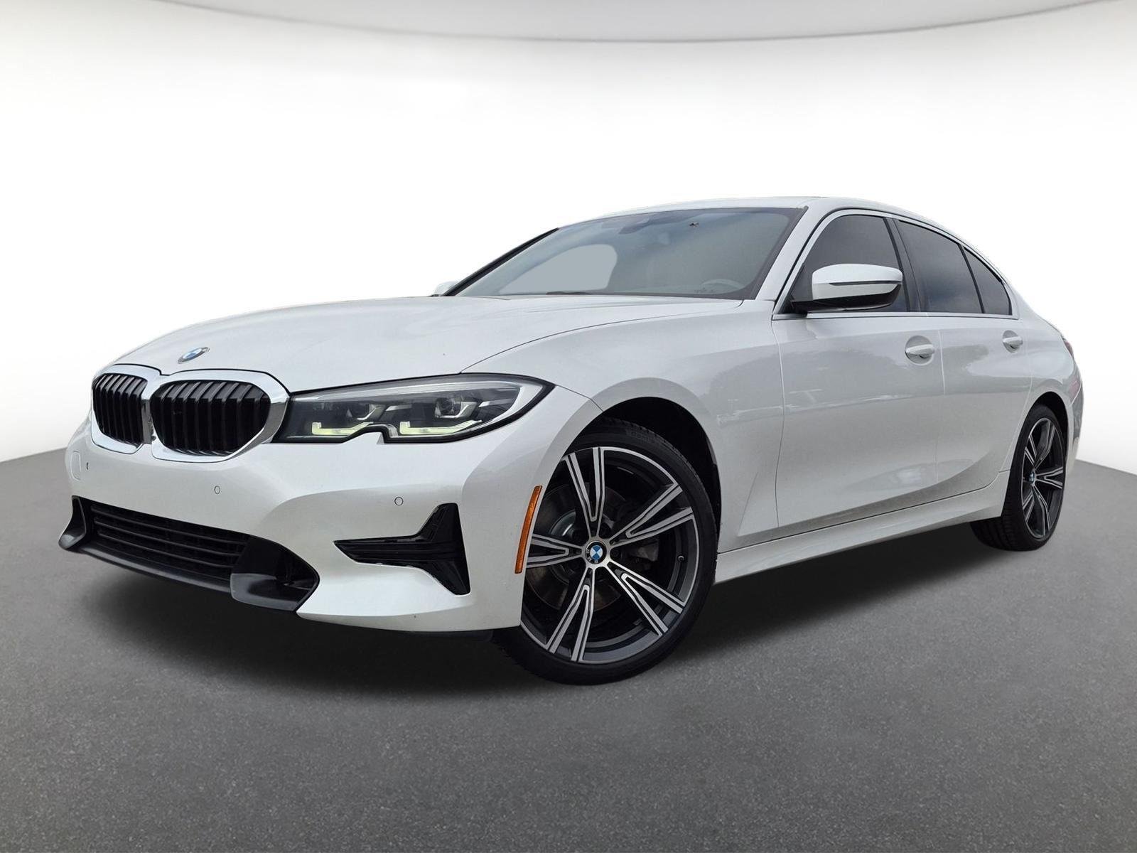 Used 2022 Mineral White Metallic BMW 330i xDrive image 1