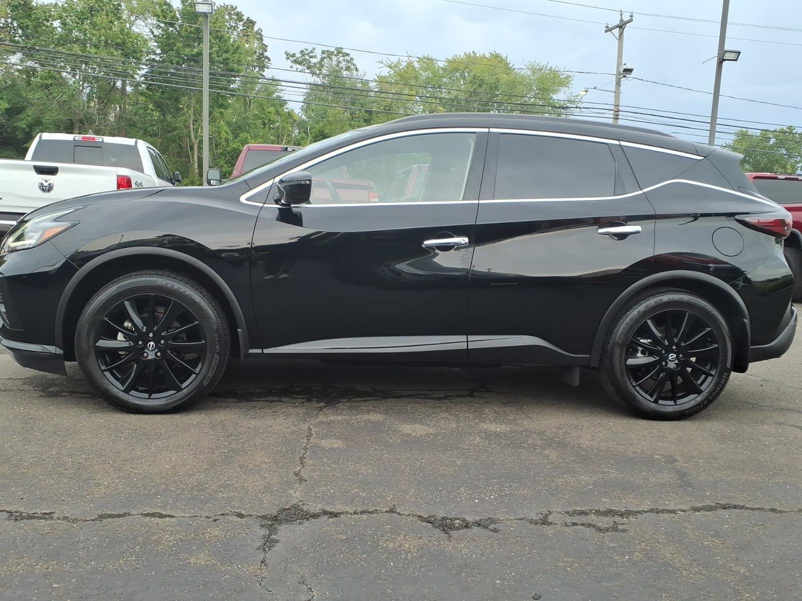 Certified Used 2023 Black Nissan SV image 8