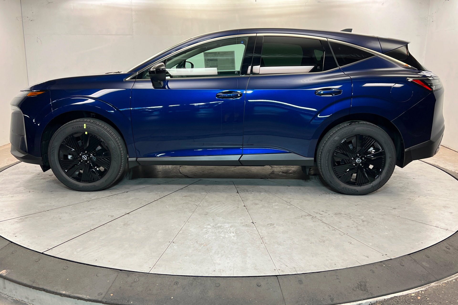 New 2026 Deep Ocean Blue Pearl Nissan SV image 2