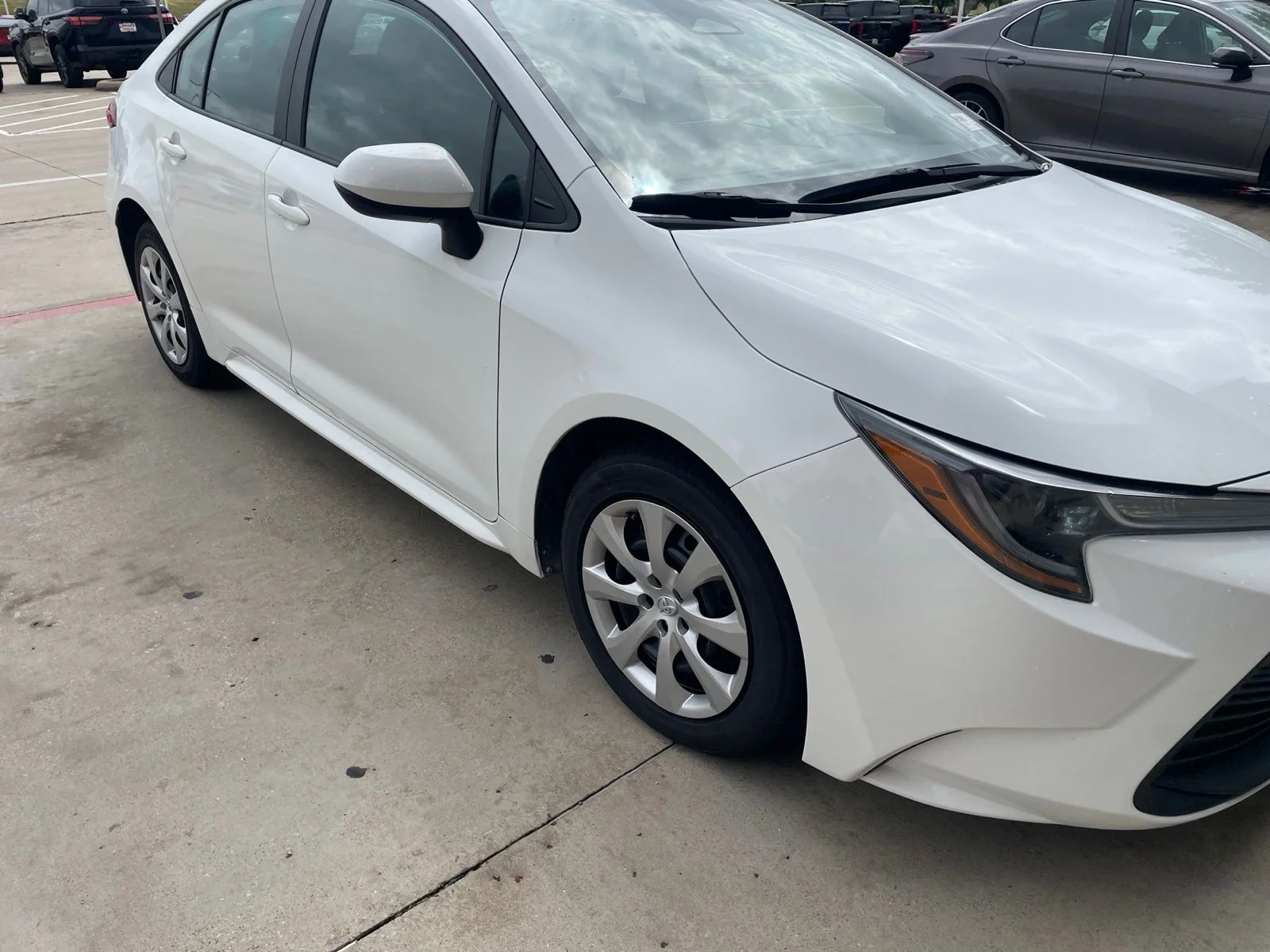 Used 2024 White Toyota LE image 4