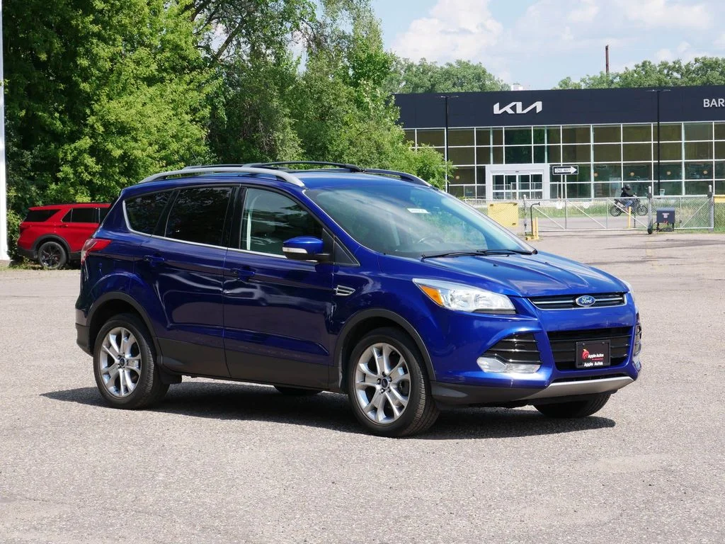Used 2015 Blue Ford Titanium image 1