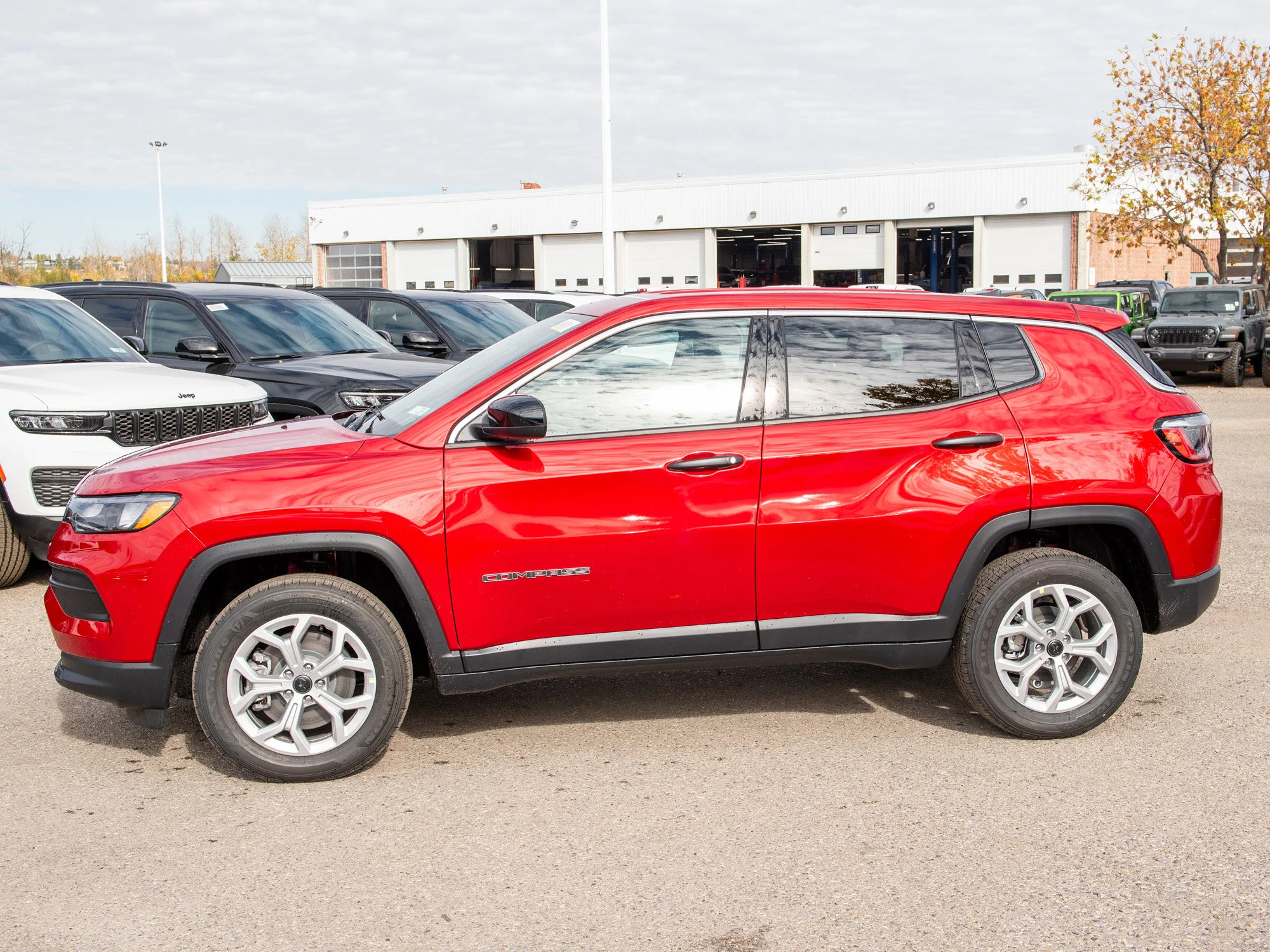 New 2026 Red Jeep Sport* image 2