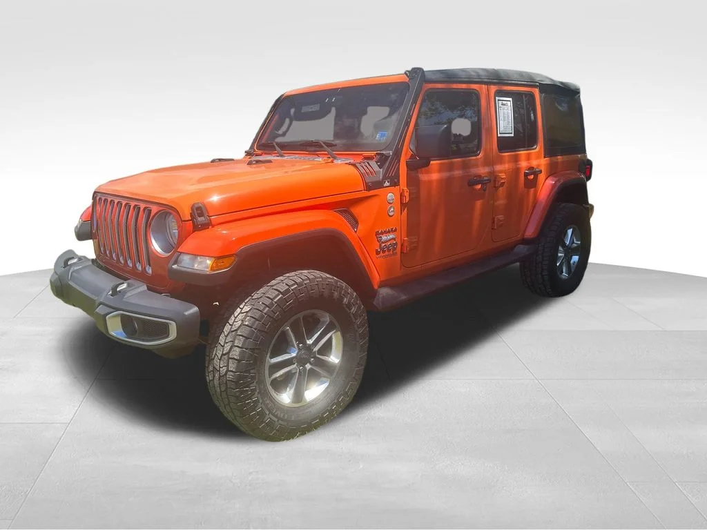 Used 2018 Orange Jeep Unlimited Sahara image 3