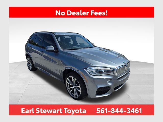 Used 2014 Gray BMW xDrive50i image 1