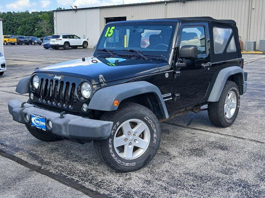 Used 2015 Black Clearcoat Jeep Sport image 1