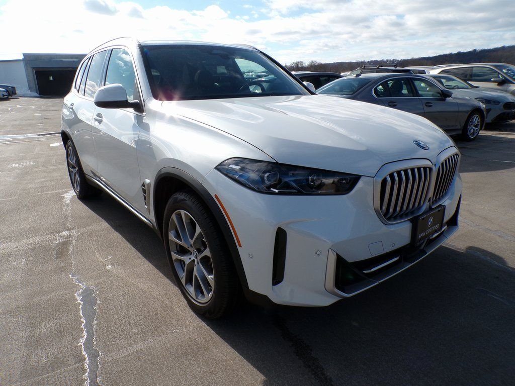 Certified Used 2026 Mineral White Metallic BMW xDrive50e image 1