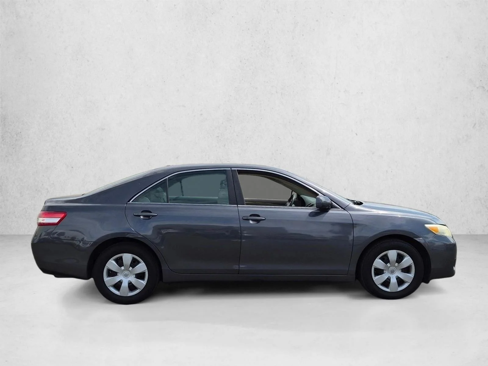 Used 2011 Magnetic Gray Metallic Toyota LE image 4