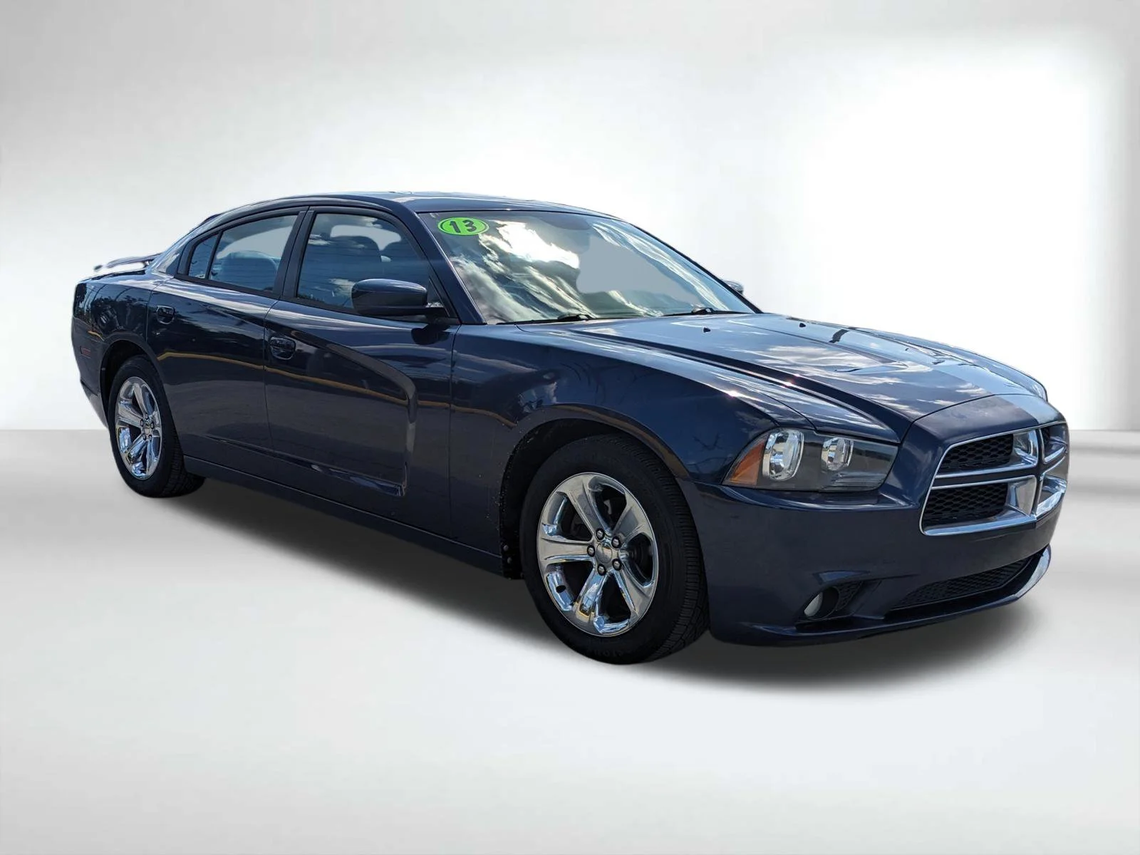 Used 2013 Dodge Charger SXT with VIN 2C3CDXHG9DH560634 for sale in Seminole, FL