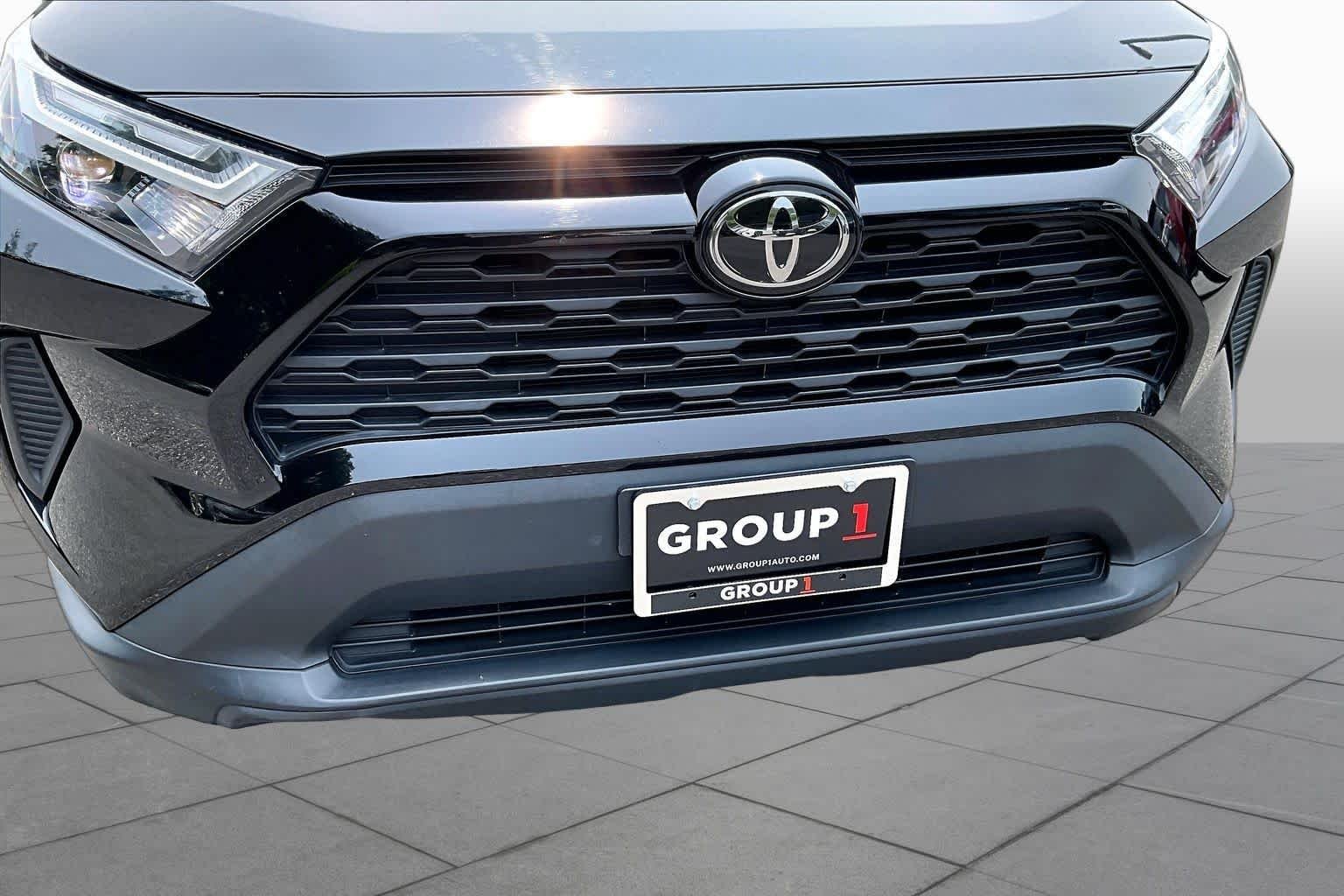 Used 2023 Midnight Black Metallic Toyota LE image 29