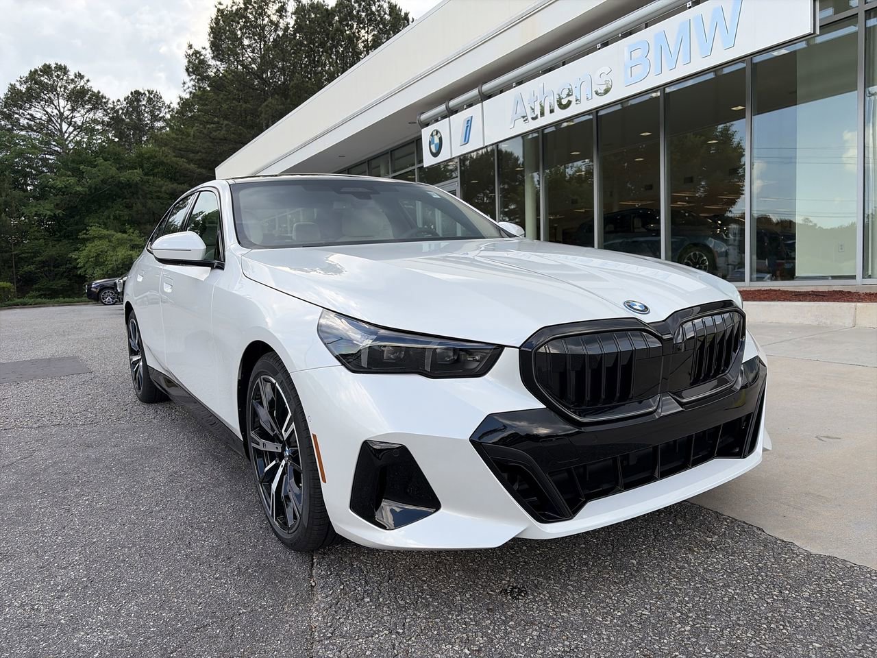 2027 BMW 5 Series 550e xDrive Sedan's photo