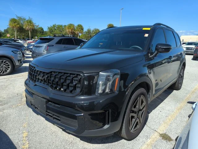 Used 2025 Black Kia EX X-Line image 2
