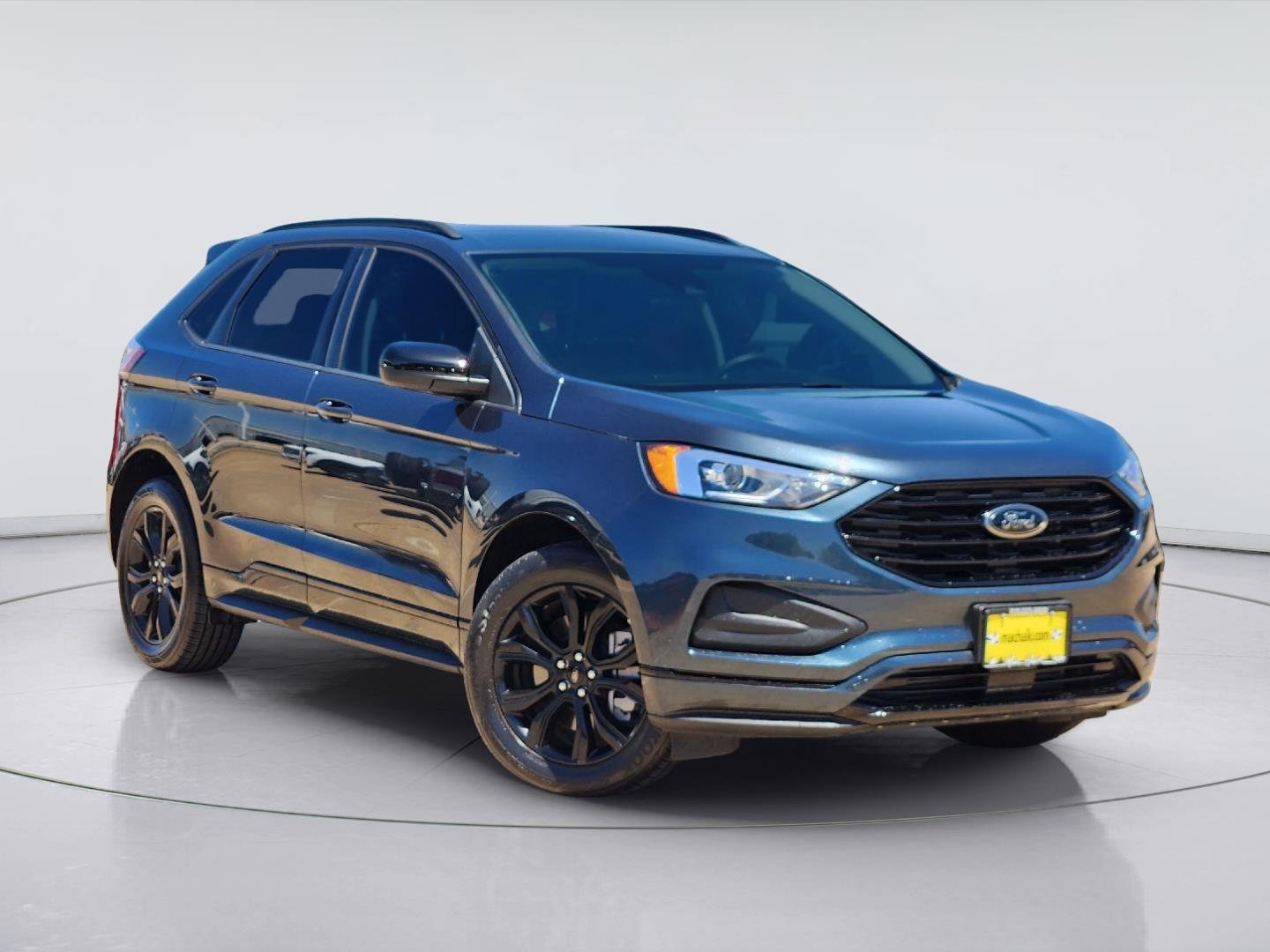 Used 2024 Stone Blue Ford SE image 1