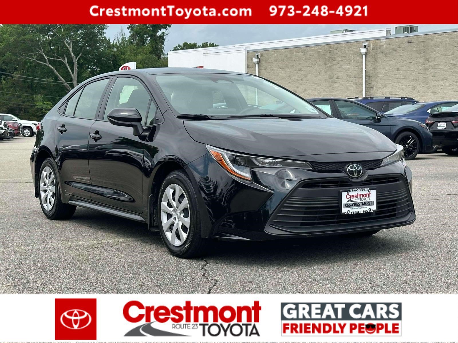 Certified Used 2023 Midnight Black Metallic Toyota LE image 2