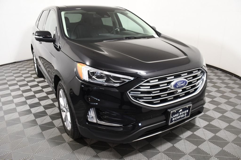 Used 2022 Agate Black Metallic Ford Titanium image 9