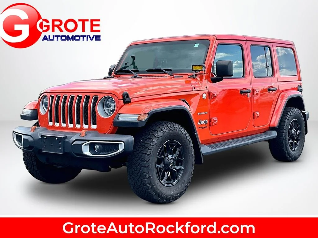 Used 2018 Orange Jeep Unlimited Sahara image 1