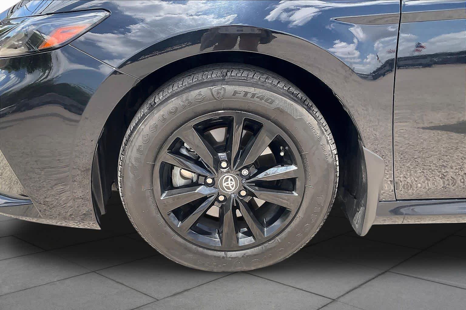 Used 2025 Midnight Black Metallic Toyota LE image 11