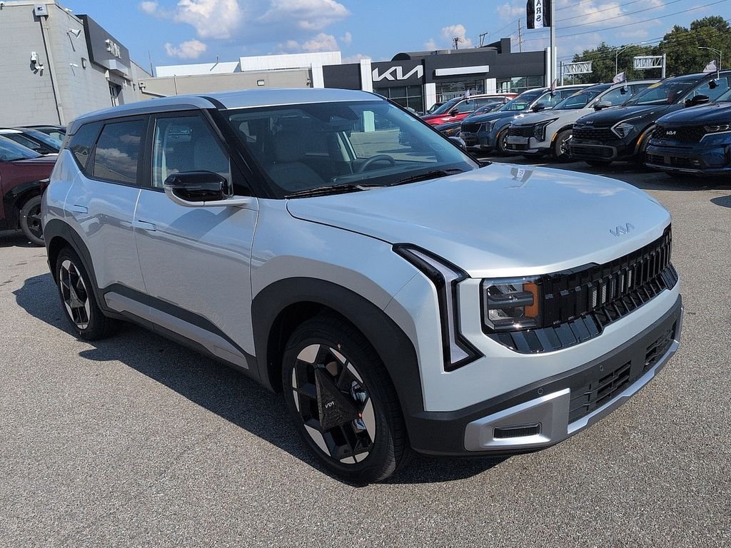 New 2027 Ivory Silver Kia EX image 1