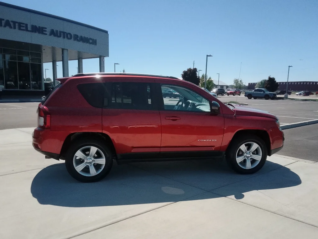 Used 2016 Deep Cherry Red Crystal Pearlcoat Jeep Sport image 2