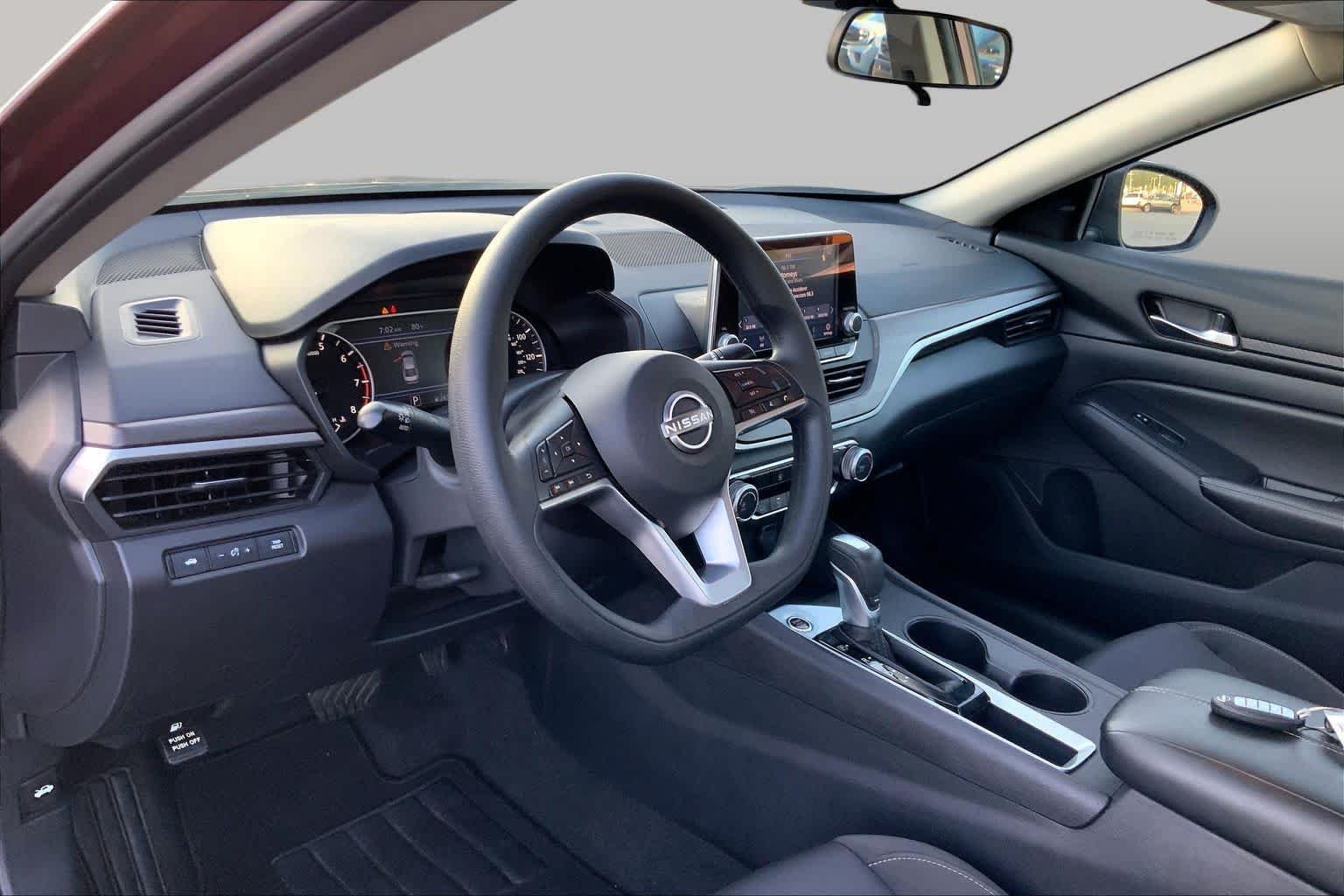 Used 2025 Garnet Pearl Metallic Nissan SV image 16