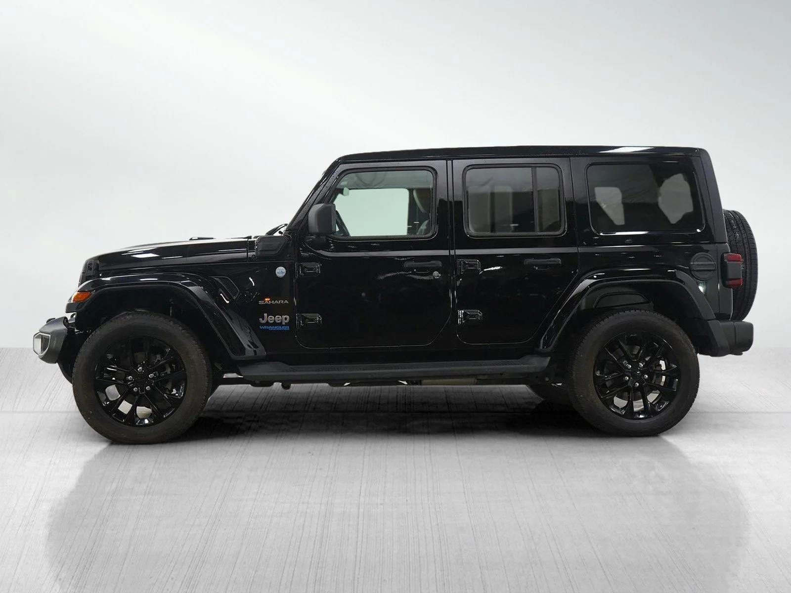 Used 2021 Jeep Wrangler Unlimited Sahara 4xe with VIN 1C4JJXP6XMW781939 for sale in Hopkins, Minnesota