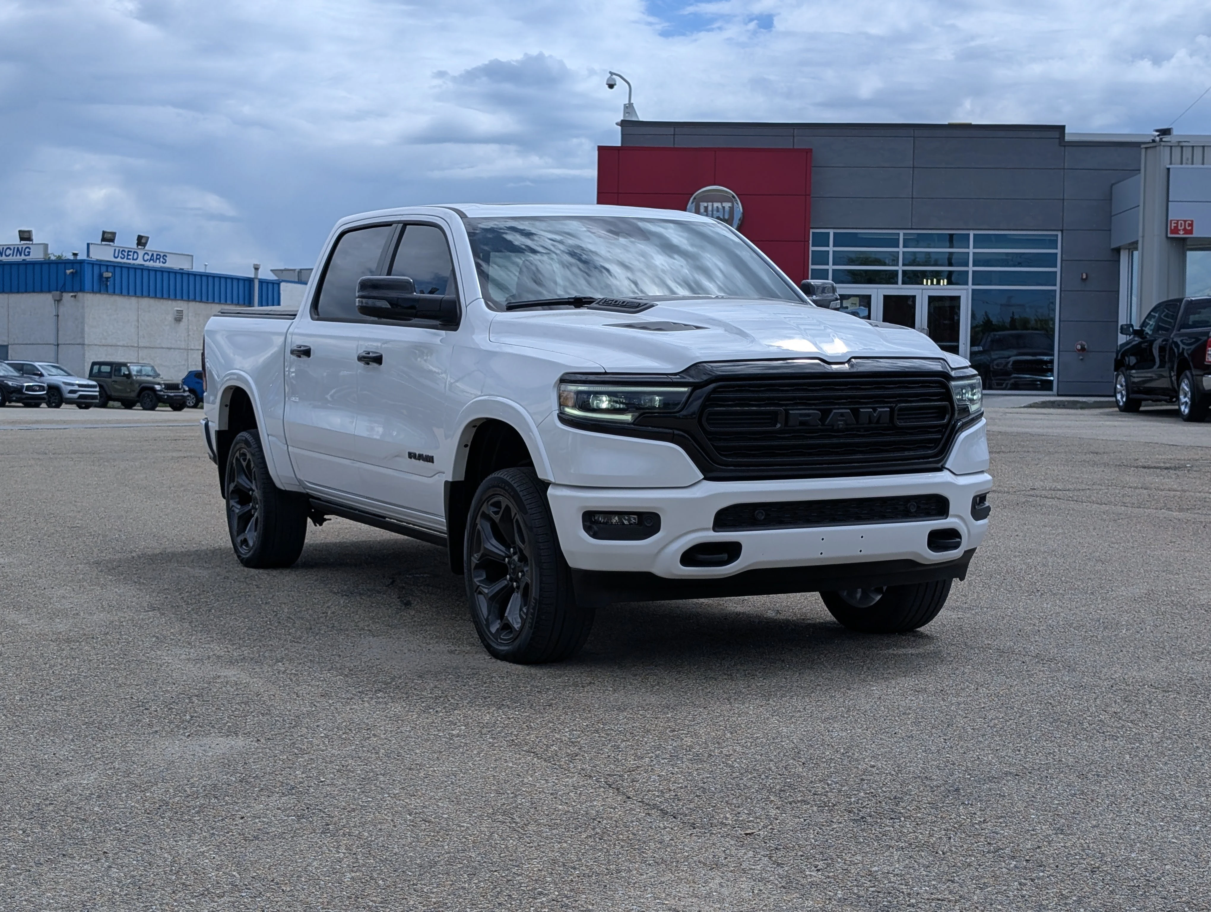 Used 2024 Ivory Tri-Coat Pearl Ram Limited image 9