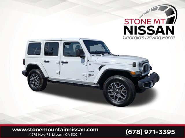 Used 2024 White Jeep Sahara image 1