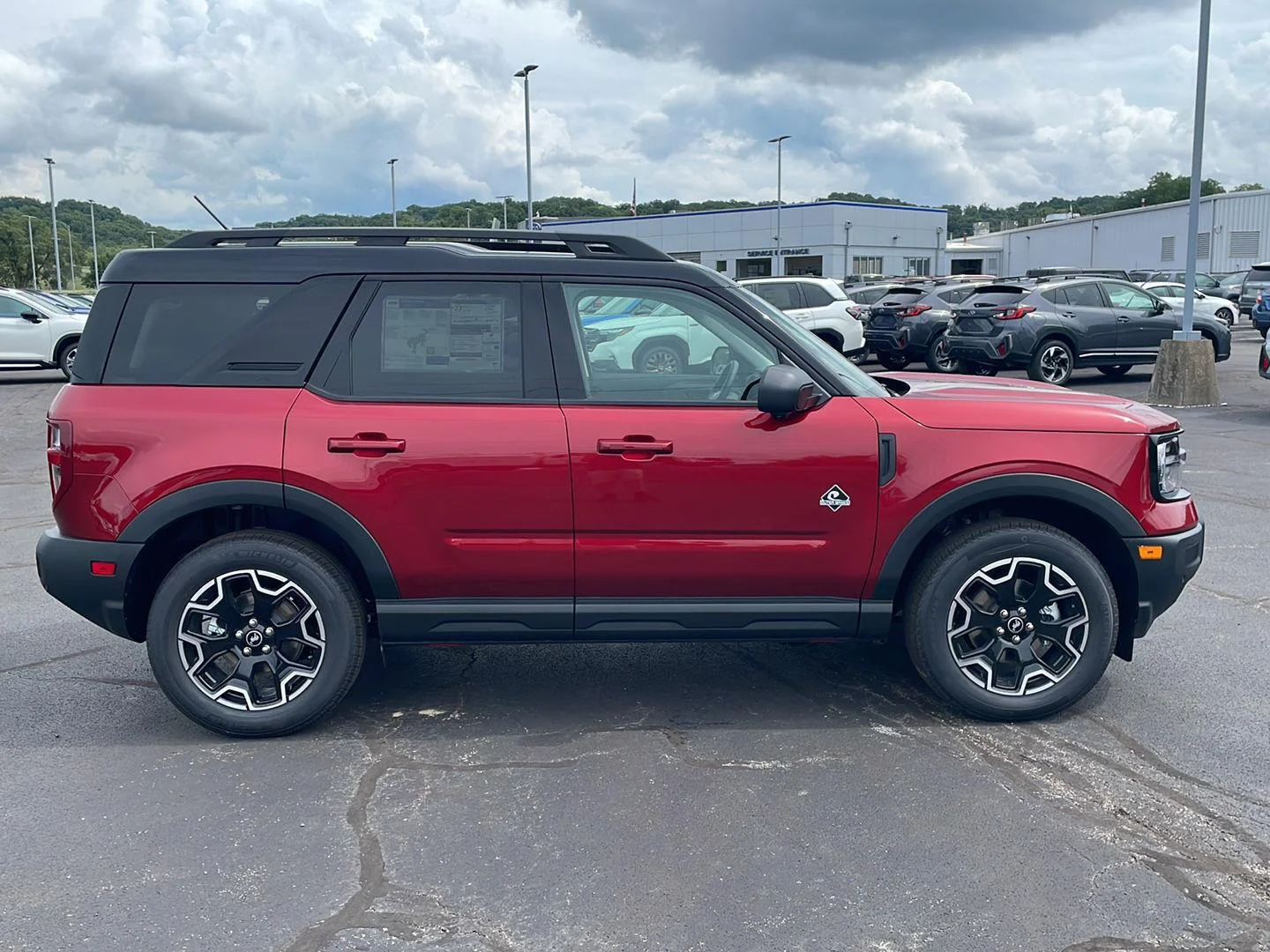 New 2026 Ruby Red Metallic Tinted Clearcoat Ford Outer Banks image 6