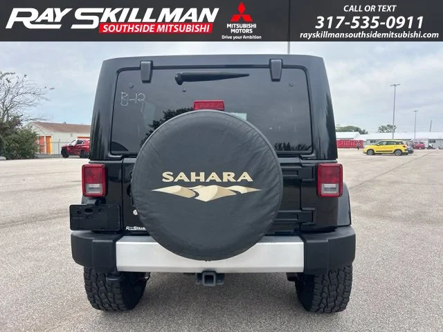 Used 2014 Black Jeep Unlimited Sahara image 6