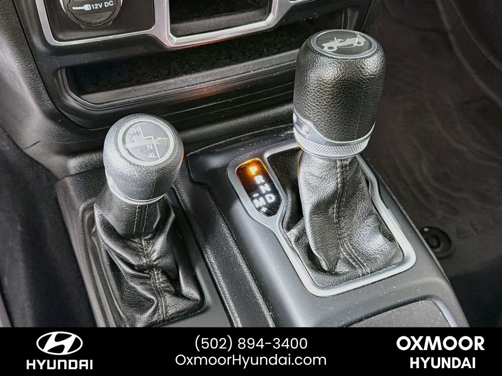 Used 2018 Granite Crystal Metallic Clearcoat Jeep Sport image 16