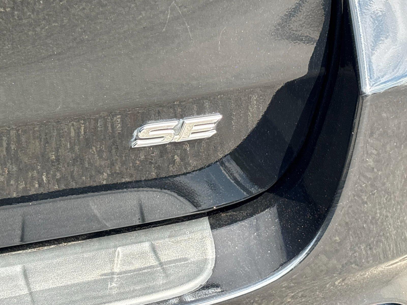 Used 2016 Midnight Black Metallic Toyota SE image 10