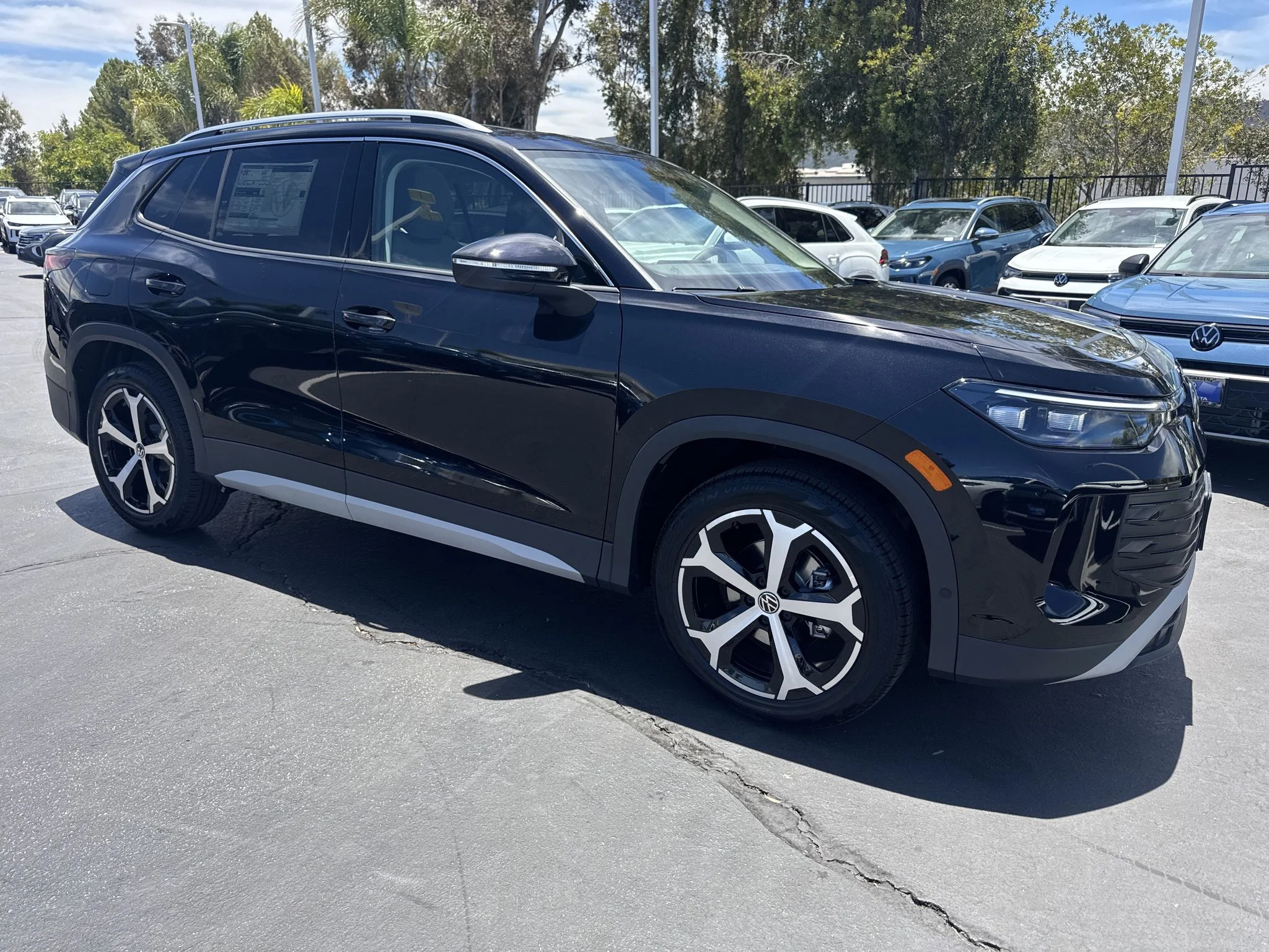 New 2026 Deep Black Pearl Volkswagen SE image 1