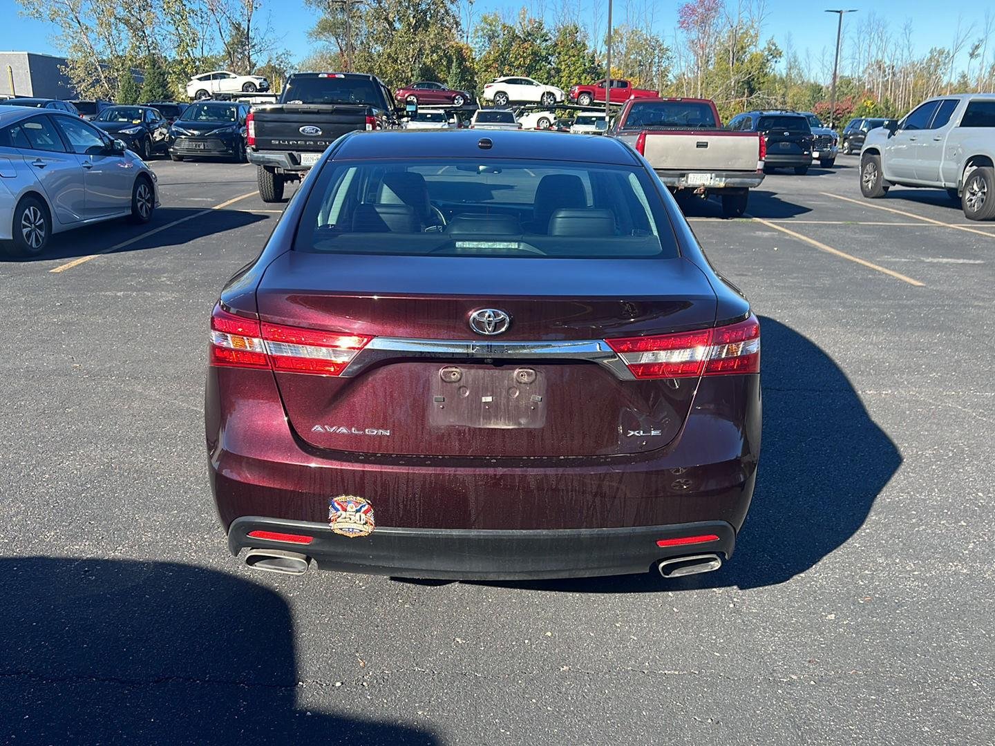 Used 2015 Sizzling Crimson Mica Toyota XLE image 3