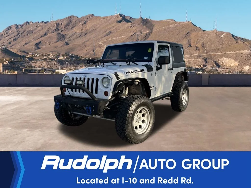 Used 2012 Bright White Jeep Sport image 1
