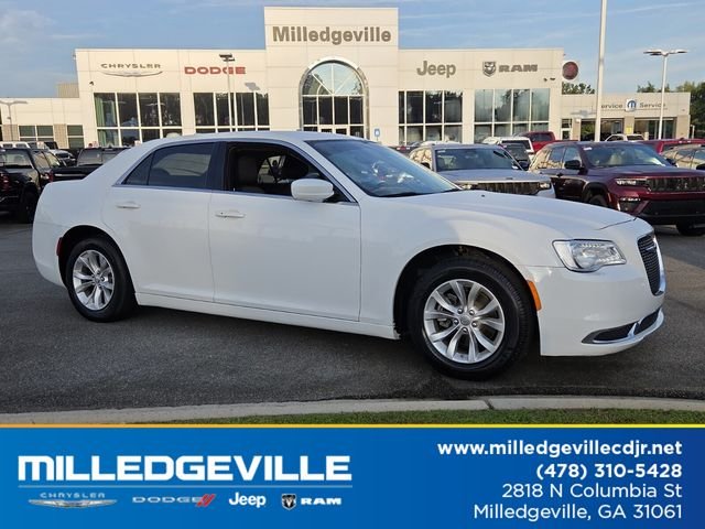 Used 2023 White Chrysler Touring image 1