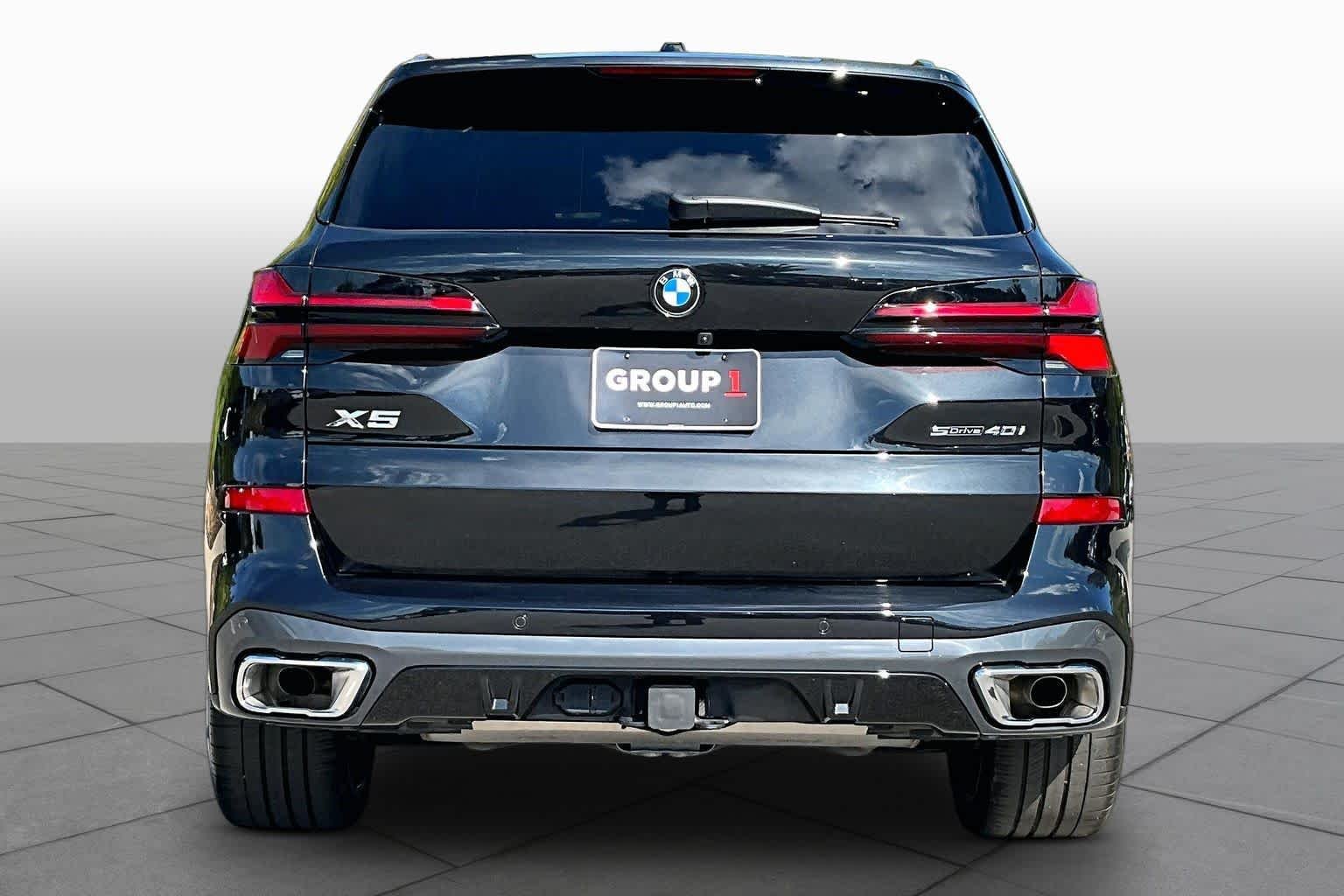Certified Used 2024 Black Sapphire Metallic BMW sDrive40i image 4
