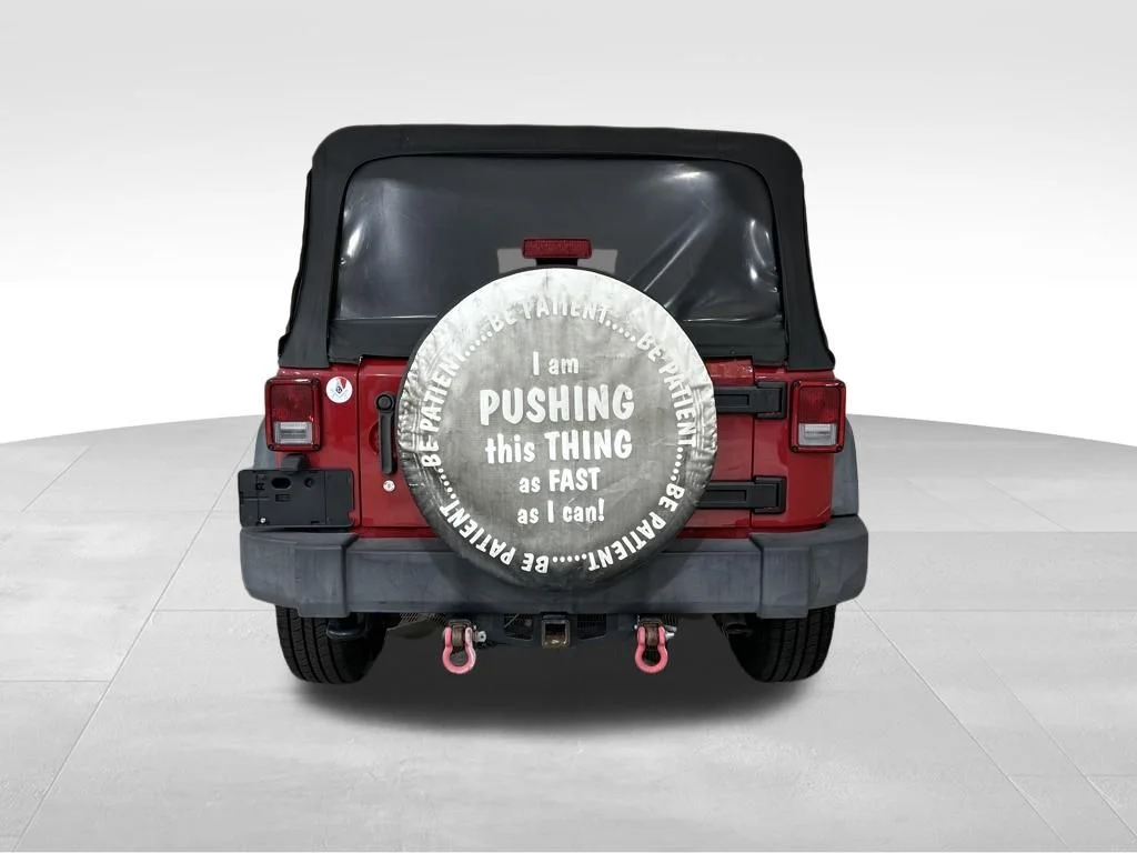Used 2014 Red Jeep Unlimited Sport image 4