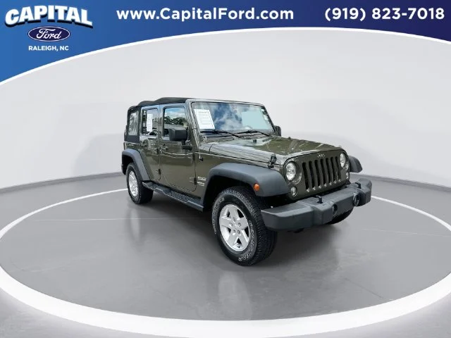 Used 2015 Green Jeep Unlimited Sport image 2
