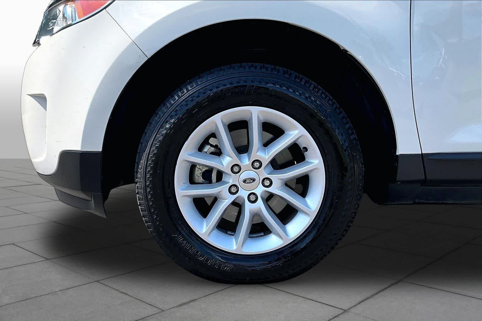 Used 2013 White Suede Ford SE image 10