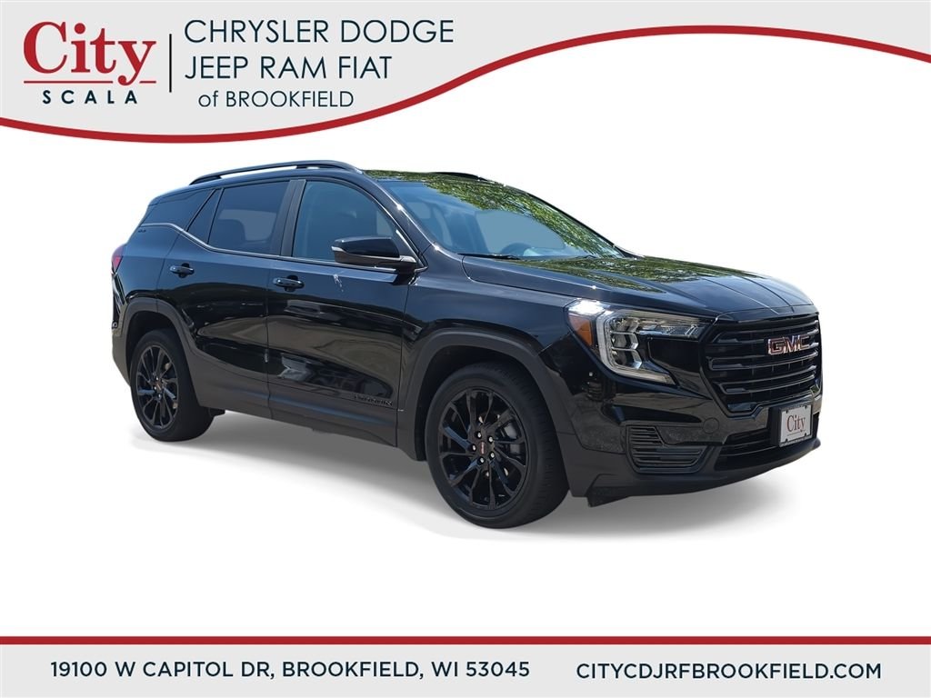Used 2024 Black GMC SLE image 1