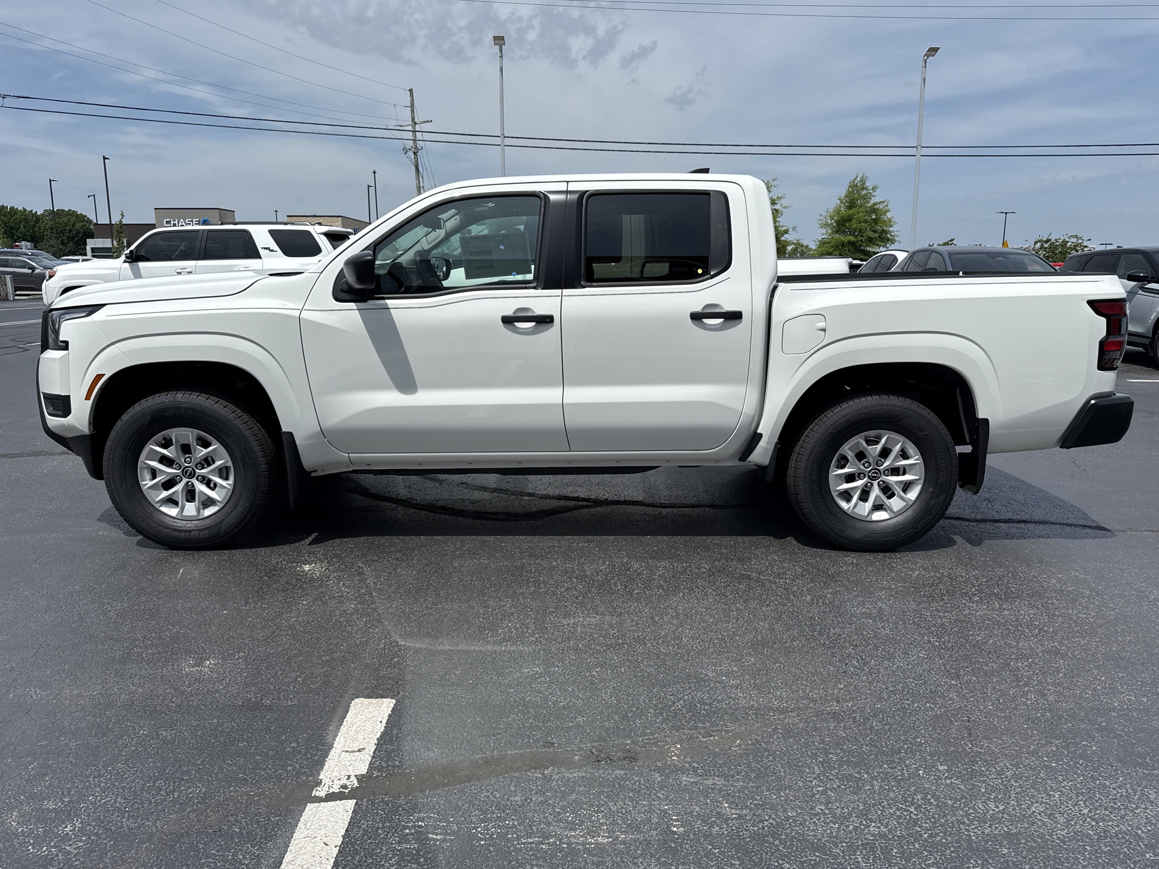 New 2026 Glacier White Nissan Crew Cab S image 9